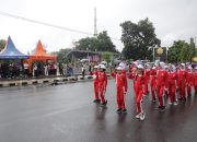 Asisten Ekbang Setda Lepas Peserta Lomba Gerak Jalan Tingkat SD se-Kota Kotamobagu