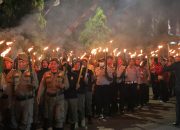 Wali Kota Kotamobagu Pimpin Upacara Taptu dan Lepas Pawai Obor Sambut HUT ke-80 RI