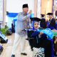 Didampingi Ayah Saat Wisuda, Noer Mayang Buktikan Keterbatasan Fisik Tak Membatasi Impian